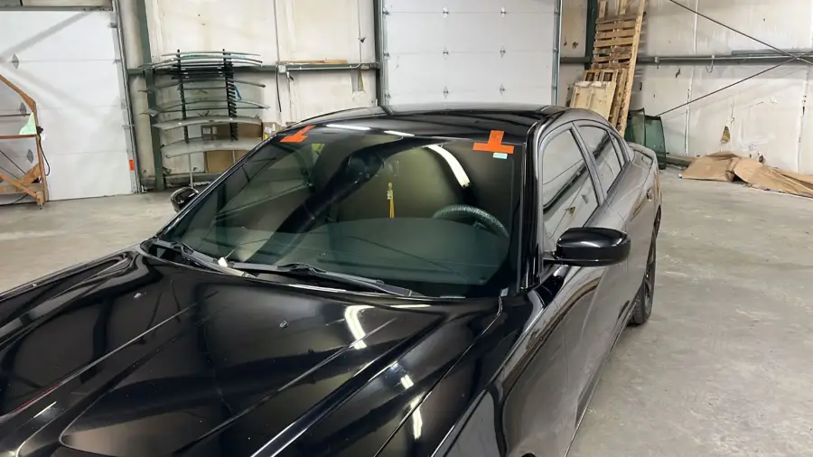 Vehicle with a newly installed windshield